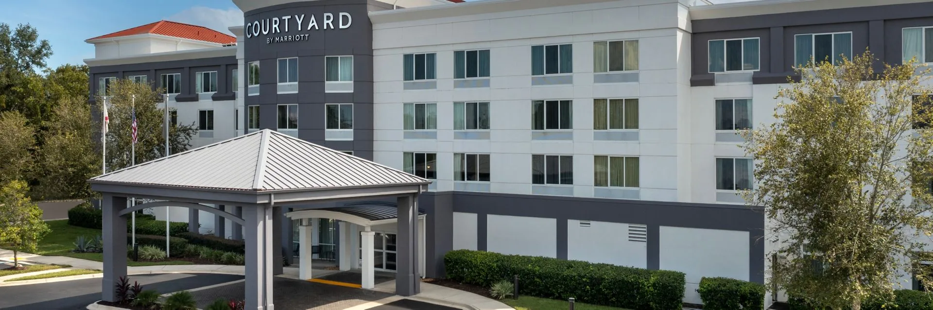 Courtyard by Marriott Jacksonville Flagler Center hotel exterior with landscaping